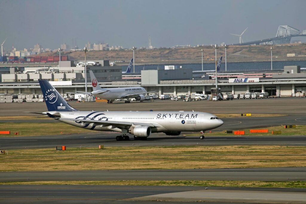 A large passenger jet sitting on the runway